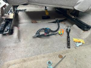 Trash under passenger seat